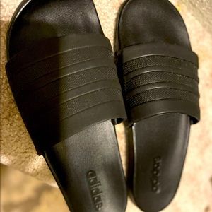 Black Adidas slides. Only worn inside.